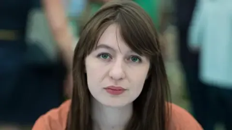The acclaimed novelist declares she will not travel to the UK because of legal concerns